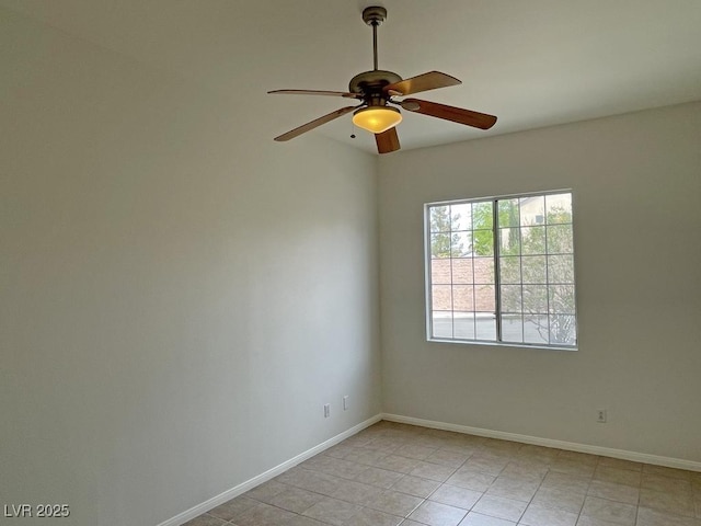 825 Happy Sparrow Ave, Henderson, NV 89052 - empty room with baseboards, ceiling fan, and light tile patterned floors