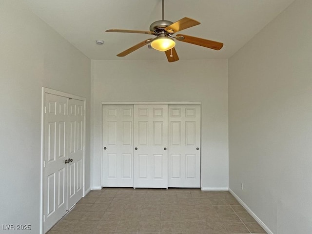 825 Happy Sparrow Ave, Henderson, NV 89052 - unfurnished bedroom featuring baseboards and a ceiling fan