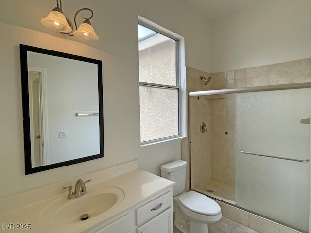 825 Happy Sparrow Ave, Henderson, NV 89052 - bathroom with a tile shower, a wealth of natural light, toilet, and vanity