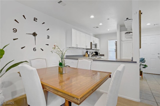 dining room with visible vents, recessed lighting, baseboards, and light tile patterned floors
