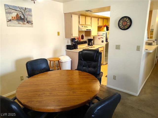 dining space with visible vents, light carpet, and baseboards