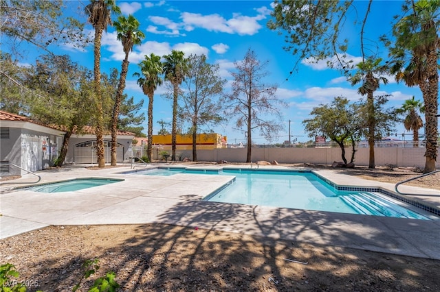 1838 N Jones Blvd, Las Vegas, NV 89108 - view of swimming pool featuring a community hot tub and a patio area