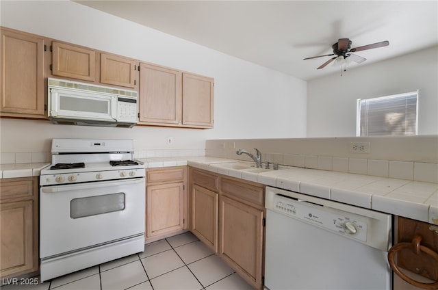 1838 N Jones Blvd, Las Vegas, NV 89108 - kitchen with white appliances, a sink, ceiling fan, a peninsula, and light brown cabinetry
