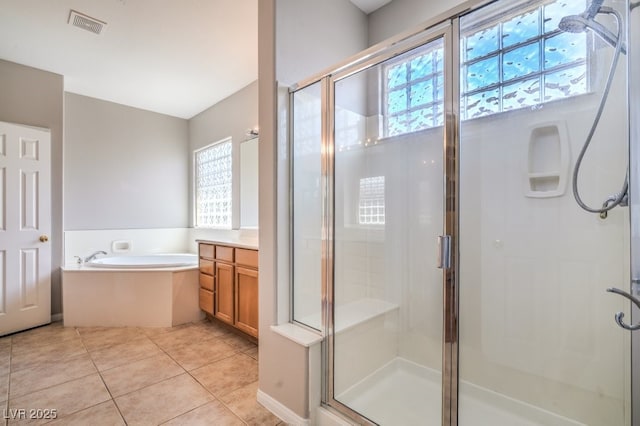2647 Ivoryhill St, Las Vegas, NV 89135 - full bath featuring a stall shower, a bath, and a healthy amount of sunlight