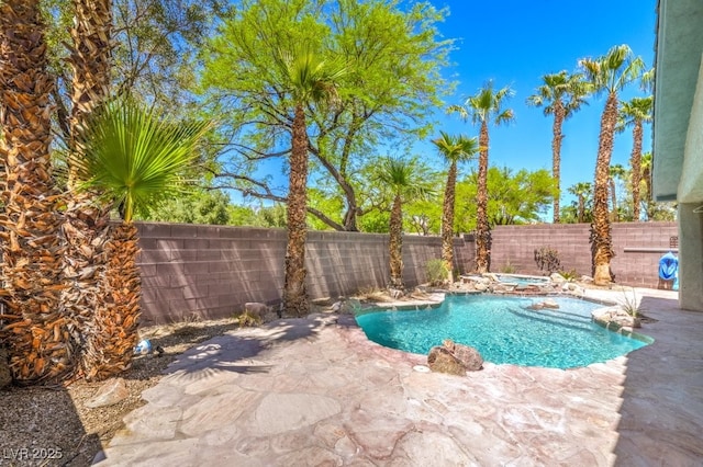 2647 Ivoryhill St, Las Vegas, NV 89135 - view of swimming pool with a patio area, a fenced backyard, a fenced in pool, and an in ground hot tub