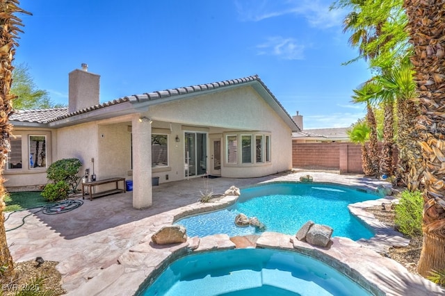 2647 Ivoryhill St, Las Vegas, NV 89135 - view of pool with fence, a patio area, and a pool with connected hot tub