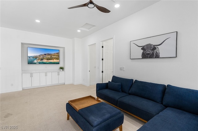 living room featuring attic access, baseboards, recessed lighting, light colored carpet, and ceiling fan