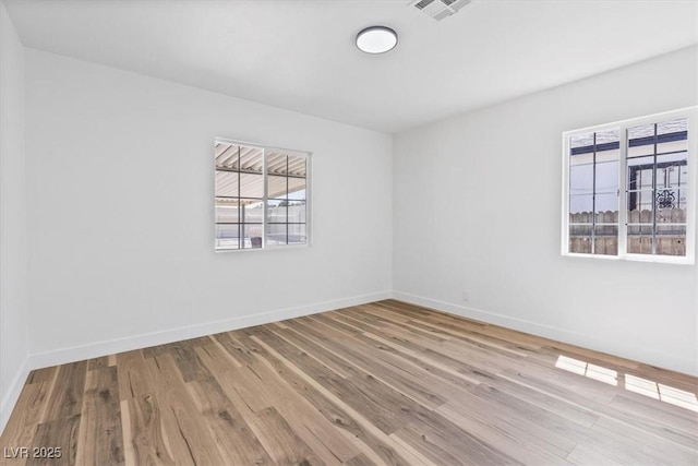 429 N 10th St, Las Vegas, NV 89101 - unfurnished room with wood finished floors and baseboards
