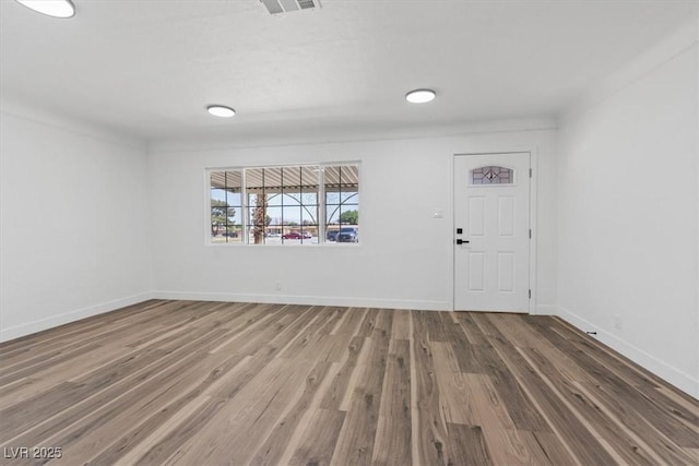 429 N 10th St, Las Vegas, NV 89101 - foyer entrance featuring wood finished floors and baseboards