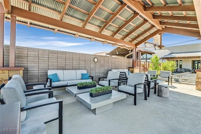 view of patio with a fenced backyard and outdoor lounge area