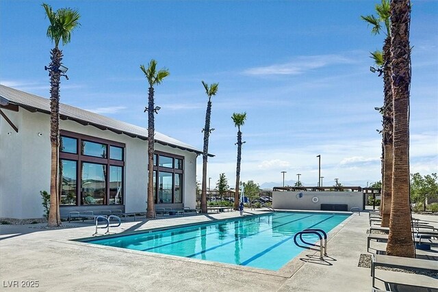 pool featuring a patio