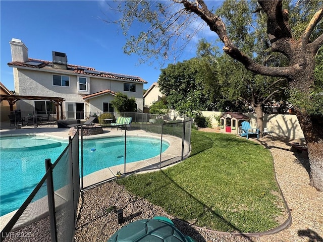 2807 Camelback Ln, Henderson, NV 89074 - view of swimming pool featuring a fenced backyard, a patio area, a fenced in pool, and a lawn