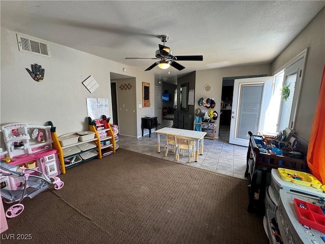 2807 Camelback Ln, Henderson, NV 89074 - game room featuring ceiling fan, a textured ceiling, visible vents, and tile patterned floors