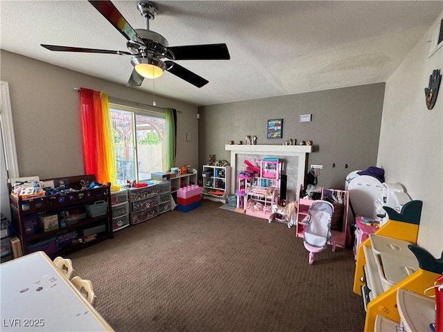 2807 Camelback Ln, Henderson, NV 89074 - playroom featuring carpet, a textured ceiling, and a ceiling fan