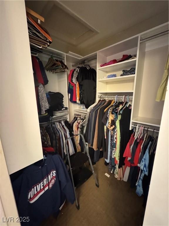 2807 Camelback Ln, Henderson, NV 89074 - walk in closet with attic access and carpet