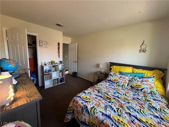 2807 Camelback Ln, Henderson, NV 89074 - bedroom featuring carpet flooring, baseboards, and visible vents