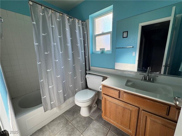2807 Camelback Ln, Henderson, NV 89074 - bathroom featuring toilet, shower / tub combo with curtain, tile patterned flooring, and vanity