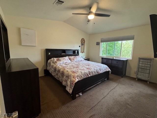 2807 Camelback Ln, Henderson, NV 89074 - bedroom with carpet flooring, a ceiling fan, visible vents, and lofted ceiling