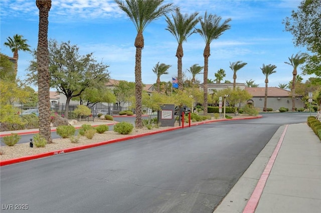 view of road with curbs and sidewalks