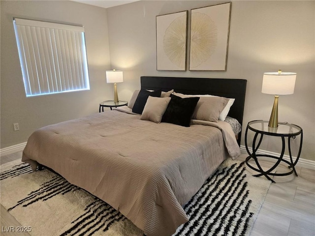 bedroom with baseboards
