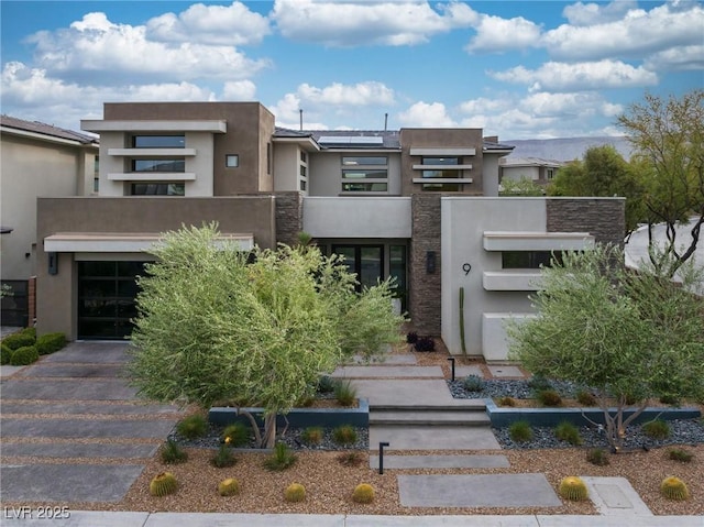 view of front of home featuring stucco siding