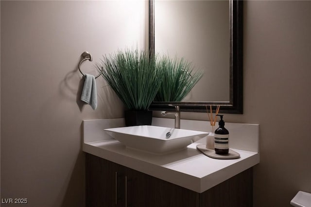 half bath featuring vanity