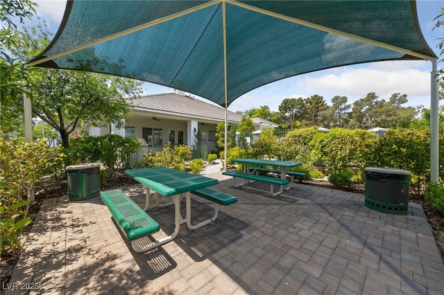 7589 Grassy Bank St, Las Vegas, NV 89139 - view of patio featuring ceiling fan and outdoor dining space