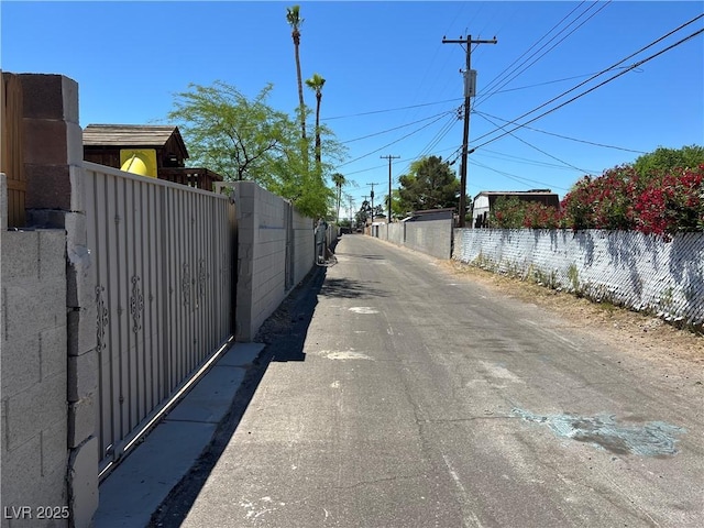 304 S Crestline Dr, Las Vegas, NV 89107 - view of street with a gate