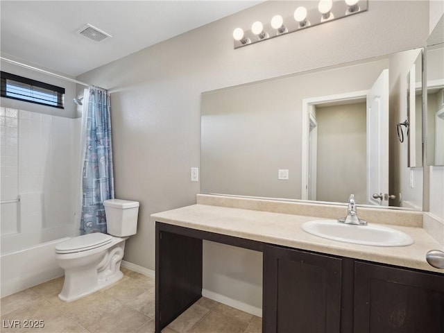 bathroom featuring toilet, vanity, shower / bath combo with shower curtain, and tile patterned floors