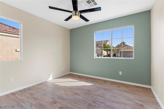 7957 Lovely Pine Pl, Las Vegas, NV 89143 - spare room with wood finished floors and ceiling fan