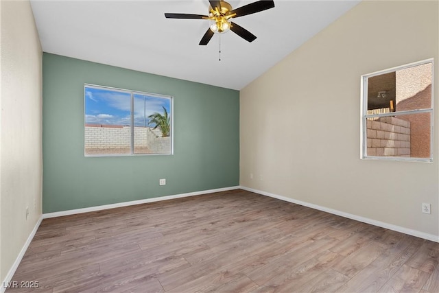 7957 Lovely Pine Pl, Las Vegas, NV 89143 - spare room featuring wood finished floors, a ceiling fan, and lofted ceiling