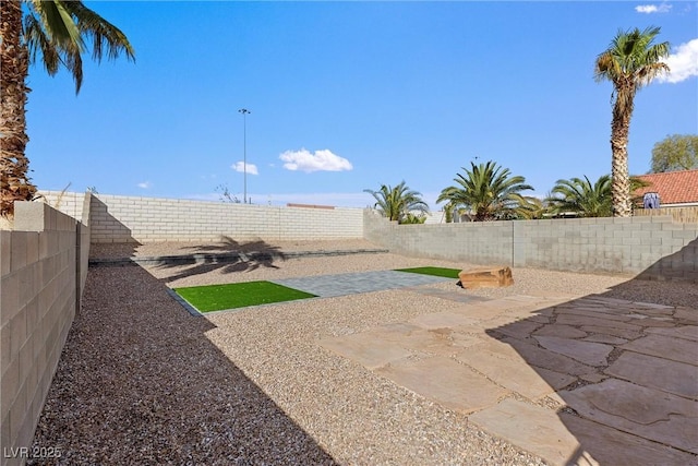 7957 Lovely Pine Pl, Las Vegas, NV 89143 - fenced backyard featuring a patio