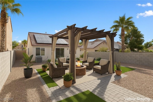 7957 Lovely Pine Pl, Las Vegas, NV 89143 - fenced backyard with an outdoor living space with a fire pit, a patio area, and a pergola
