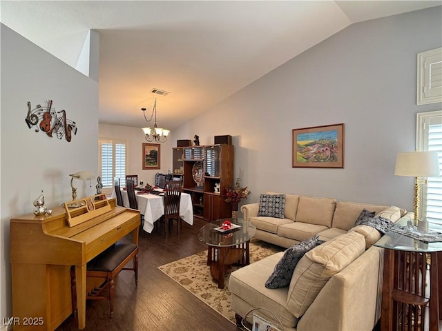 2022 Big Bend Way, Henderson, NV 89074 - living room with vaulted ceiling, a chandelier, and dark wood-type flooring