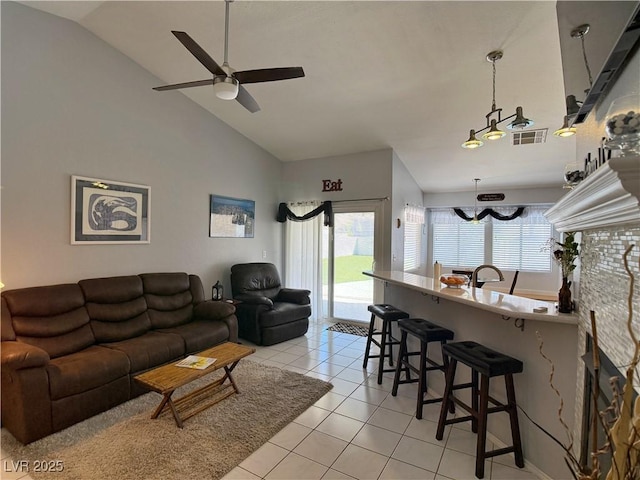 2022 Big Bend Way, Henderson, NV 89074 - living area with a ceiling fan, light tile patterned flooring, and high vaulted ceiling