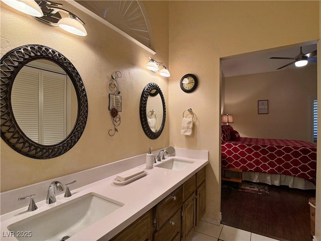 2022 Big Bend Way, Henderson, NV 89074 - ensuite bathroom with tile patterned floors, double vanity, and ceiling fan