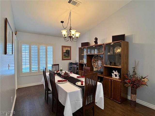 2022 Big Bend Way, Henderson, NV 89074 - dining space with a chandelier and dark wood-style floors