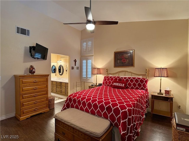 2022 Big Bend Way, Henderson, NV 89074 - bedroom with dark wood finished floors, ensuite bathroom, lofted ceiling, and ceiling fan