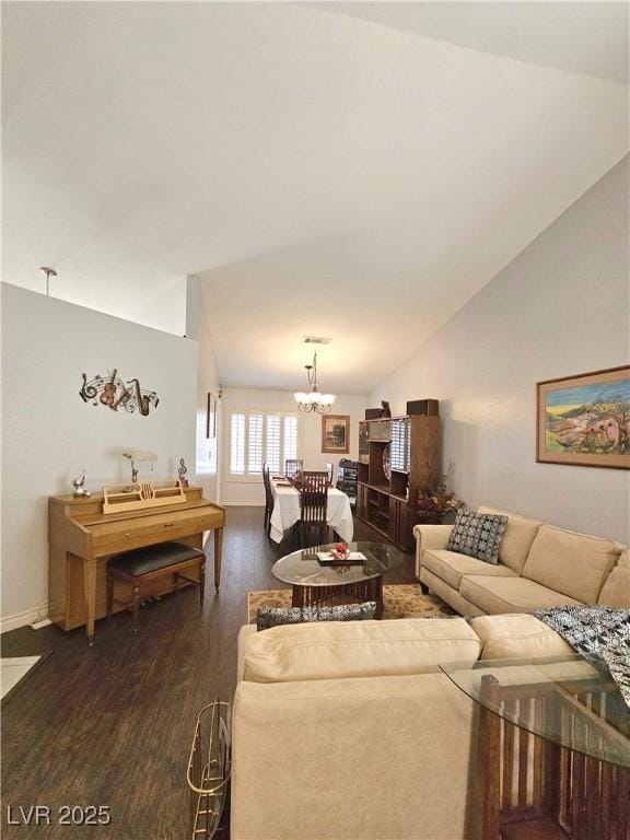 2022 Big Bend Way, Henderson, NV 89074 - living room featuring lofted ceiling, a chandelier, and dark wood-style floors