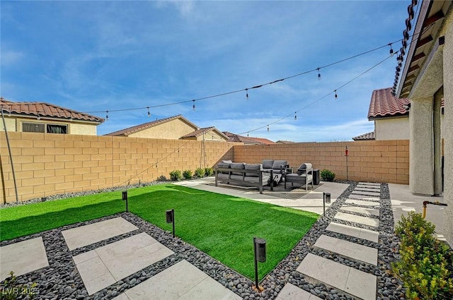 6544 Sandero Springs St, Las Vegas, NV 89166 - view of yard with a fenced backyard, an outdoor living space, and a patio