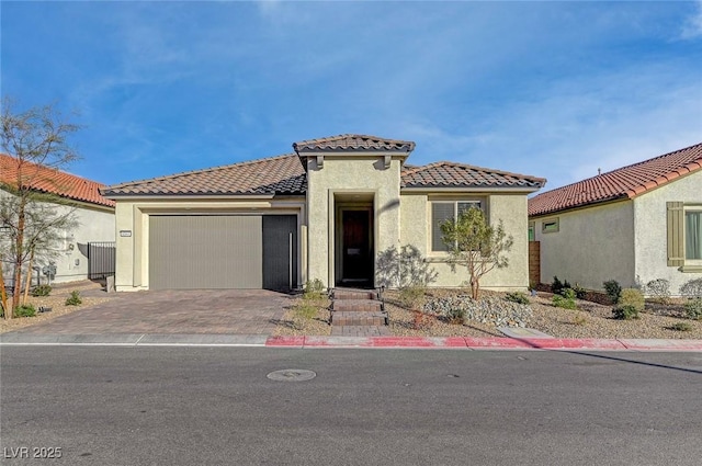 6544 Sandero Springs St, Las Vegas, NV 89166 - mediterranean / spanish-style house featuring an attached garage, a tile roof, driveway, and stucco siding