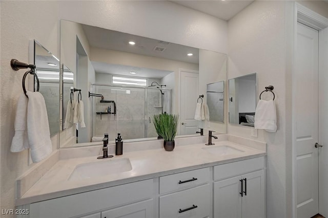 6544 Sandero Springs St, Las Vegas, NV 89166 - full bathroom featuring recessed lighting, a sink, a shower stall, and double vanity