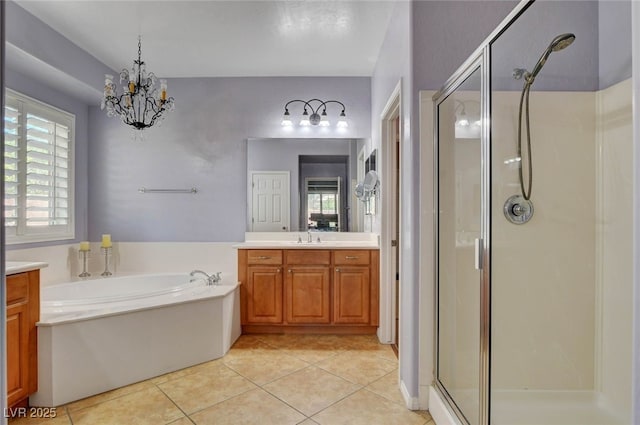 full bath featuring a bath, a shower stall, and vanity