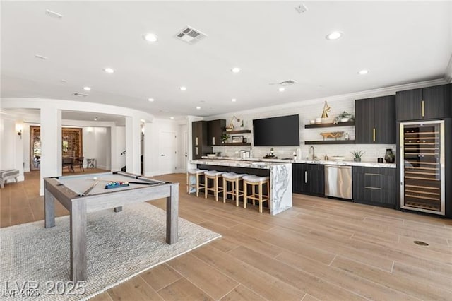 playroom featuring wine cooler, wet bar, recessed lighting, crown molding, and pool table