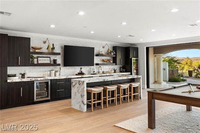bar featuring crown molding, visible vents, billiards, and tasteful backsplash