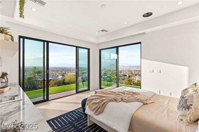 bedroom featuring recessed lighting, light wood-type flooring, and visible vents