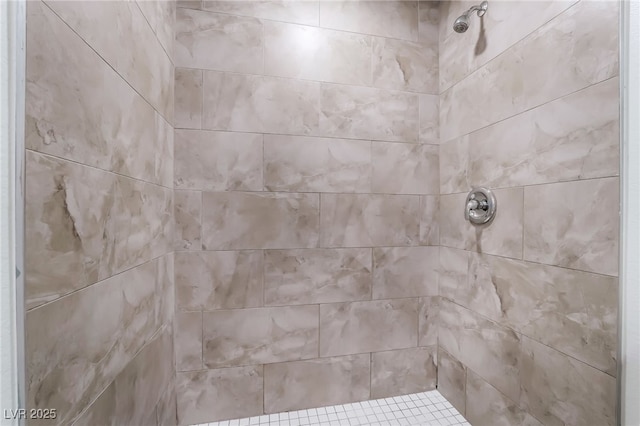 details with a tile shower