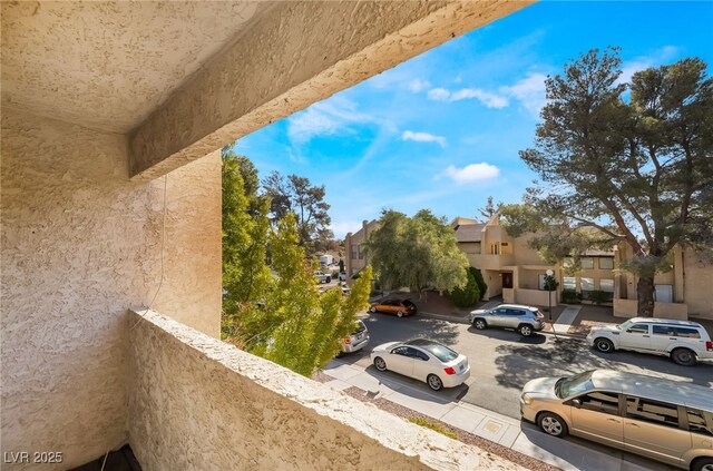 balcony featuring a residential view