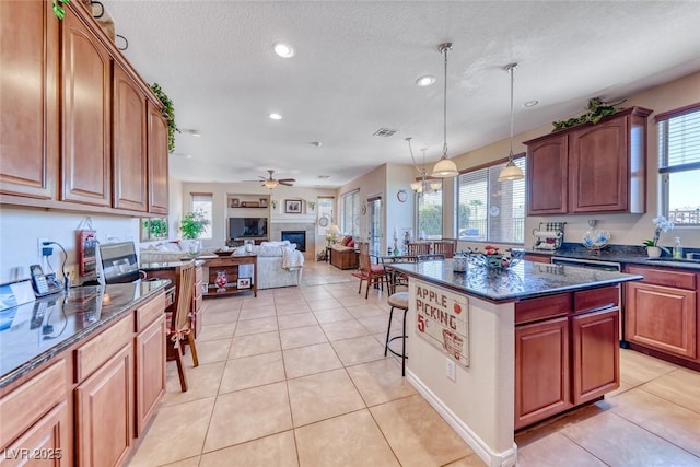 2733 Auchmull St, Henderson, NV 89044 - kitchen with recessed lighting, healthy amount of natural light, open floor plan, and ceiling fan