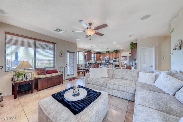 2733 Auchmull St, Henderson, NV 89044 - living area with ceiling fan and light tile patterned floors